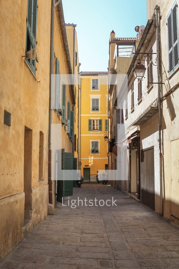 narrow alley between buildings in Europe