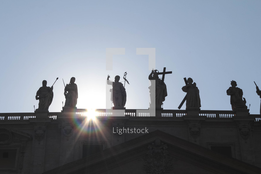 statues on a roof in the vatican in Rome 