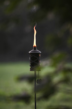flames on a tiki torch 