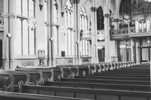 rows of pews in a cathedral 