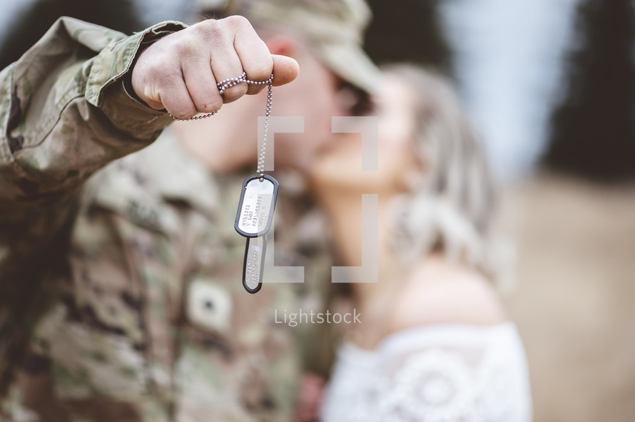 military couple kissing 