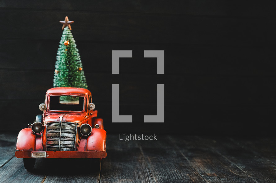 vintage red truck and Christmas tree 