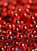 Red beaded glass garland for Christmas tree.