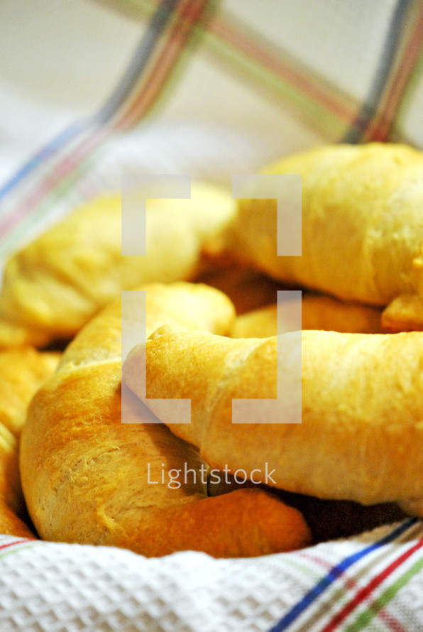 Fresh-baked bread in cloth-lined basket