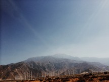 wind farm and a mountain 