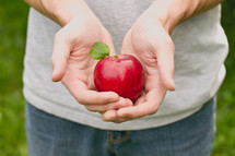 man holding an apple