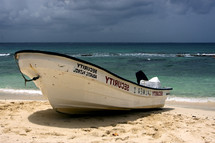 beached boat on a beach 