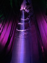 purple light in a cavern 