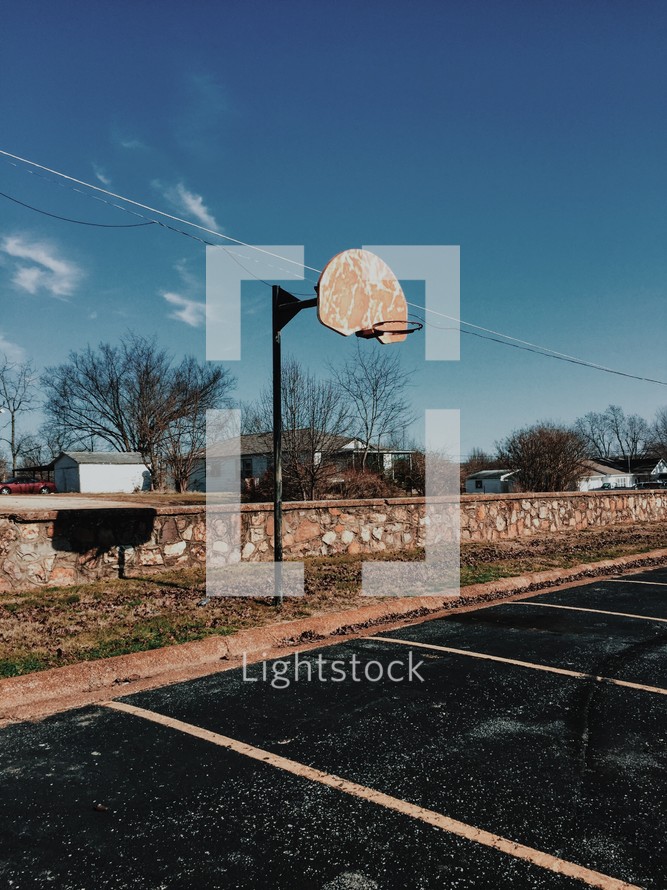basketball goal in a parking lot