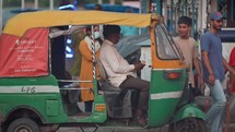 Yellow Auto rickshaw three-wheeled taxi in Vizag Visakhapatnam, India