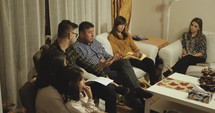 People at a bible study in a living room