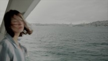 Girl standing on a yacht