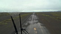 Fast off road ride in buss in rainy Iceland nature
