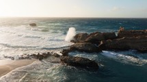 Horizon line with rocks and sea waves