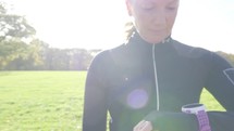 Female caucasian woman checking her pulse on a smartwatch
