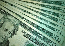 Money--nice crisp twenty dollar bills of United States currency.