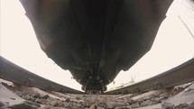 A view from below on the railway and freight train in motion