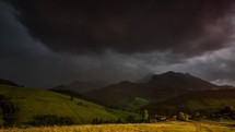 Storm is coming with dark dramatic clouds over rural country Time lapse

