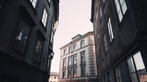 Scandinavian facades of old town houses in narrow streets