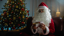 Santa Claus searching Through Christmas letters 