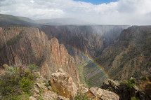 rainbow over a canyon 