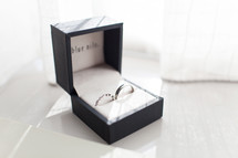 wedding bands in a jewelry gift box 