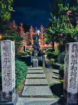 Path That Leads To An Old Buddidt Statue In Tokyo 
