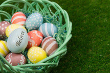 painted Easter eggs in a basket 