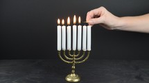 lighting a menorah 