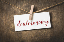 word Deuteronomy hanging on a clothesline 