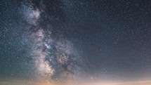 Milky way galaxy stars sky astronomy time lapse background
