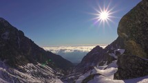 Panorama of winter alps mountains valley in beautiful sunny day
