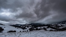 Dramatic Grey clouds sky motion fast in winter countryside landscape Timelapse
