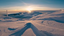 Frozen Winter wonderland nature at sunrise in alps mountains landscape adventure background