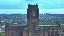 Historic Liverpool cathedral against a sprawling urban landscape