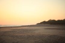 sand on a beach at sunset 