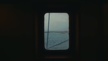 view of the water out a ferry window 