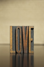 word love in wood blocks 