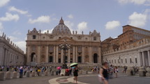 Vatican, Rome. St. Peter's Square full of tourists. View to St. Peter's Basilica. Vatican is a holy place, the heart of Christian culture and religion. Timelapse.