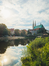 church along a river 