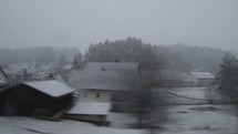 road trip through a snowy town 