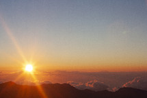 sunrise over a mountaintop 