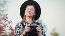 Young hipster photographer woman