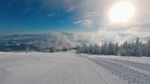 Panorama of empty ski resort closed in beautiful winter season

