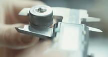 quality inspection of metal parts using a micrometer