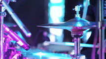 Young man playing electronic drums on stage