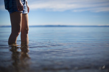 legs wading in water 