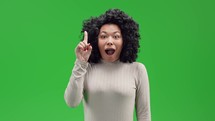 Woman on green screen thinking and having an idea