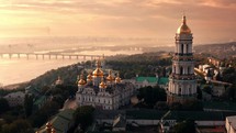 Golden domed monastery in Kyiv Ukraine during sunrise