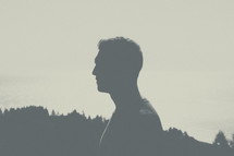 silhouette of a man's side profile. 